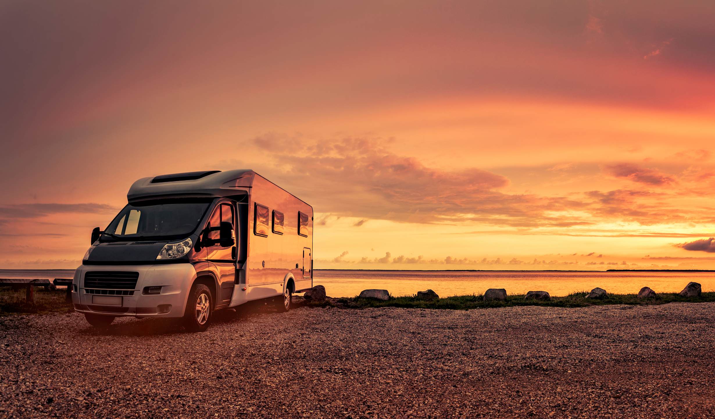 Camper,Van,At,Sunset,On,Beach